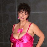 Mature wife Kim posing in sexy pink lingerie