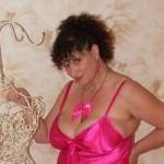 Mature wife Kim posing in sexy pink lingerie